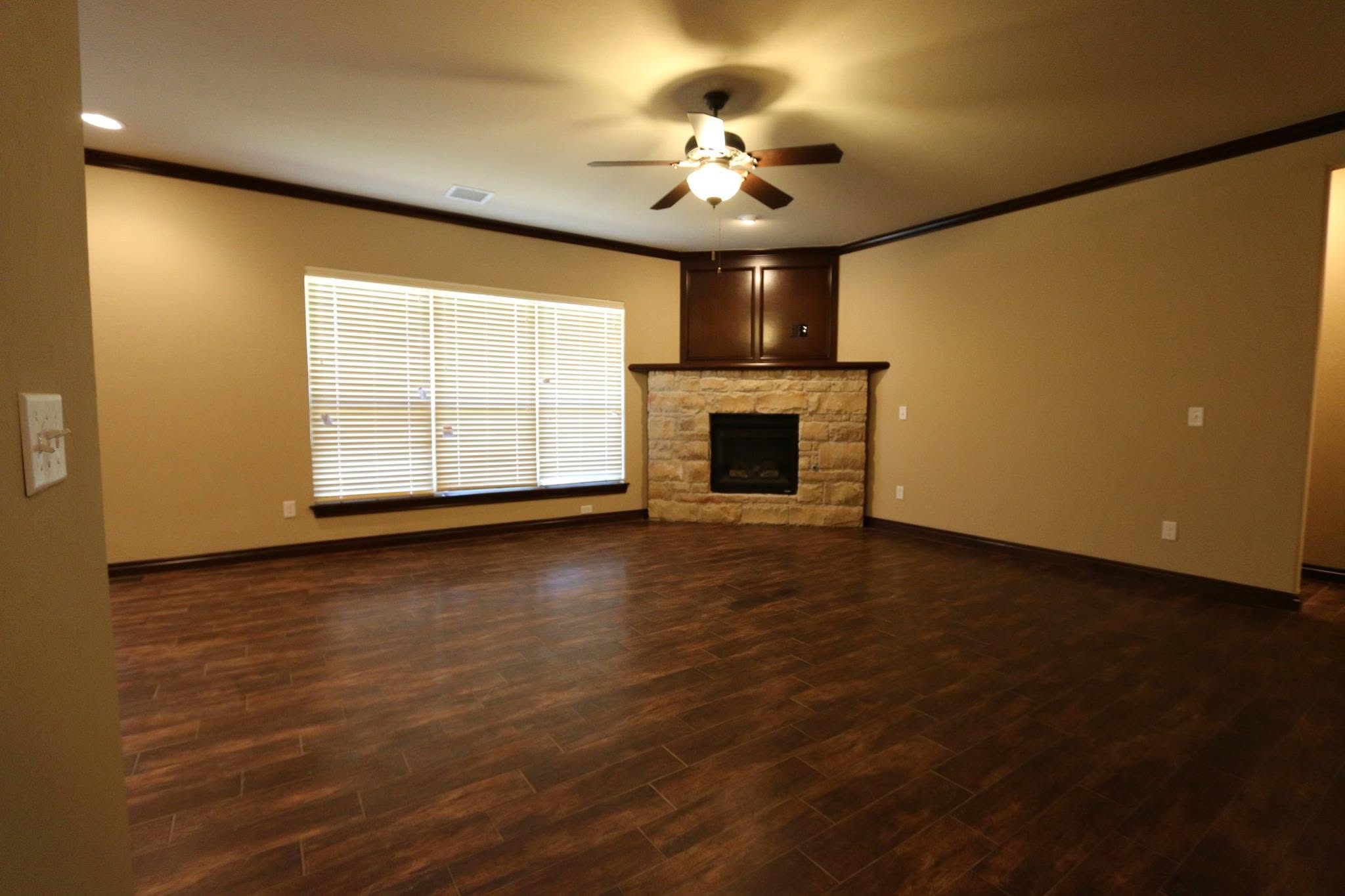 Decorative ceiling timber beams and mantel in living room