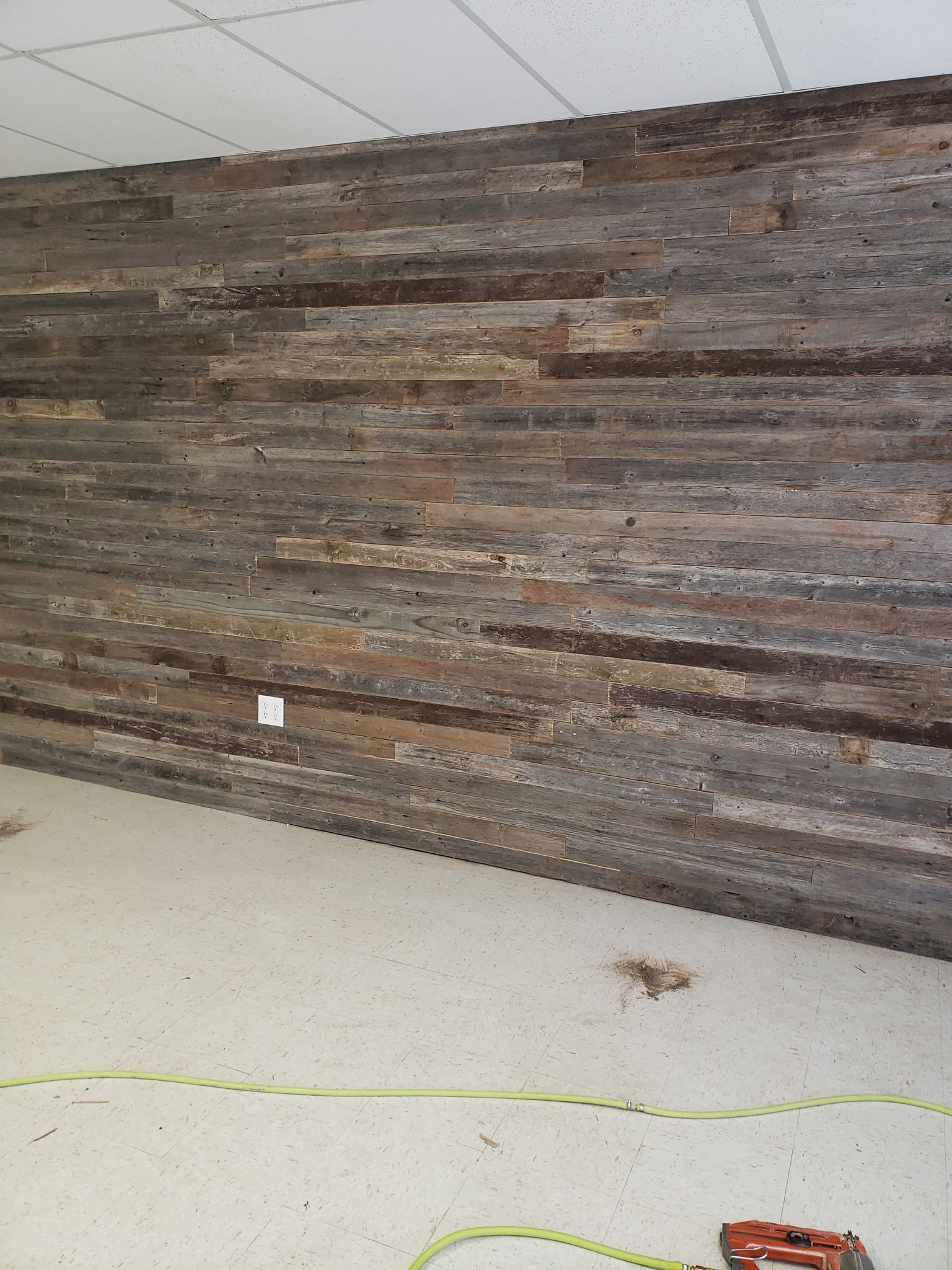 Refurbished wood walls and custom mantles