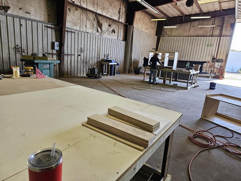 Sawdust And Splinters craftsmen team working on wood in the shop